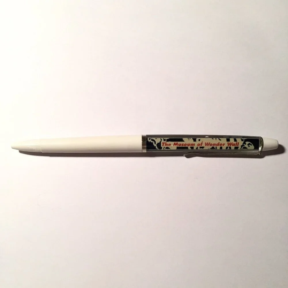 The Museum of Wonder Wall Floaty Pen Japan Souvenir Promo Man on Bike Moves Art